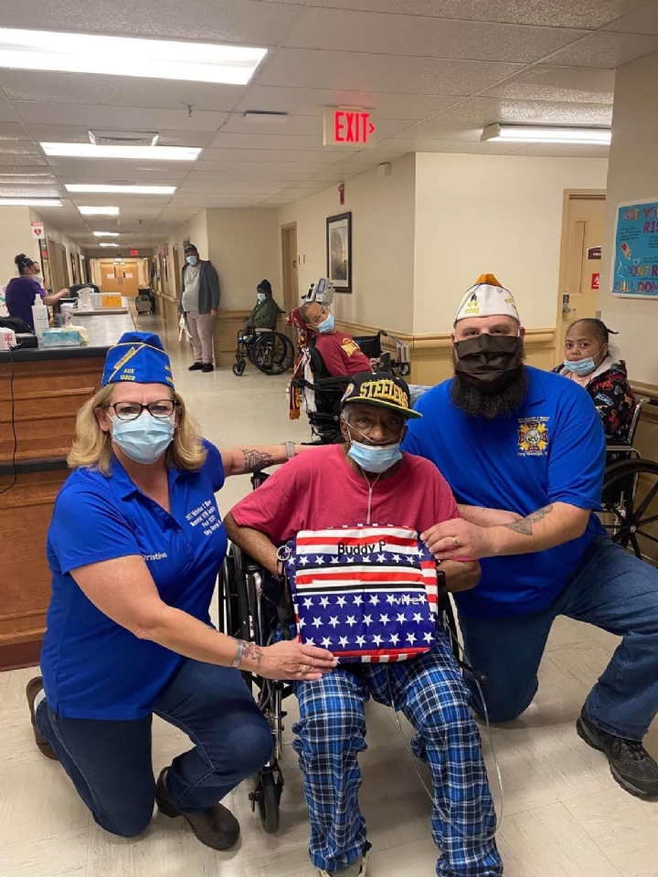 Helping SGT Nicholas C. Mason Memorial VFW Post 12202 Auxiliary hand out personalized patriotic bags filled with goodies to the Veterans currently in long term care at Heritage Hall. We hand delivered each bag and took some time to chat with each Veteran.